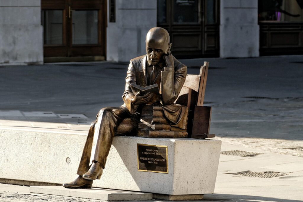 estatua-de-homem-lendo-1024x682 O Que É Mais Importante: História ou Escrita Bonita?
